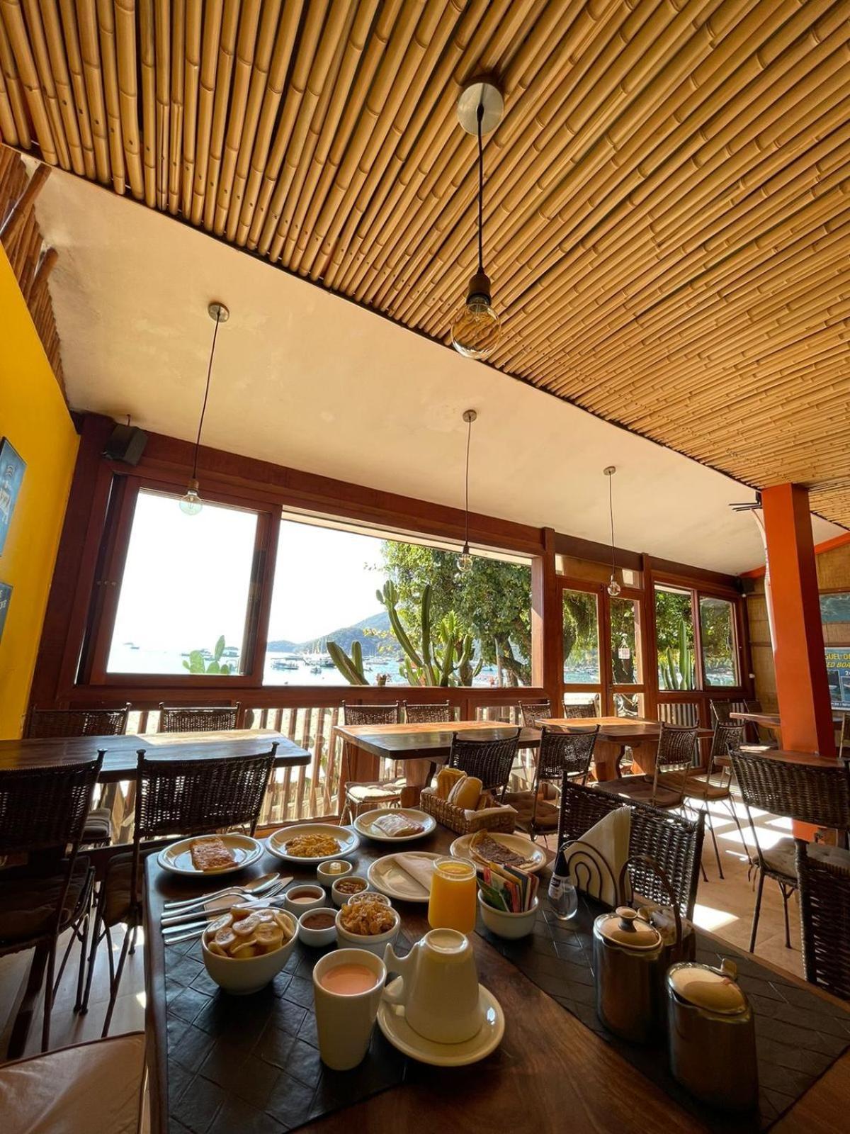 Pousada E Restaurante O Pescador Abraão Exterior foto